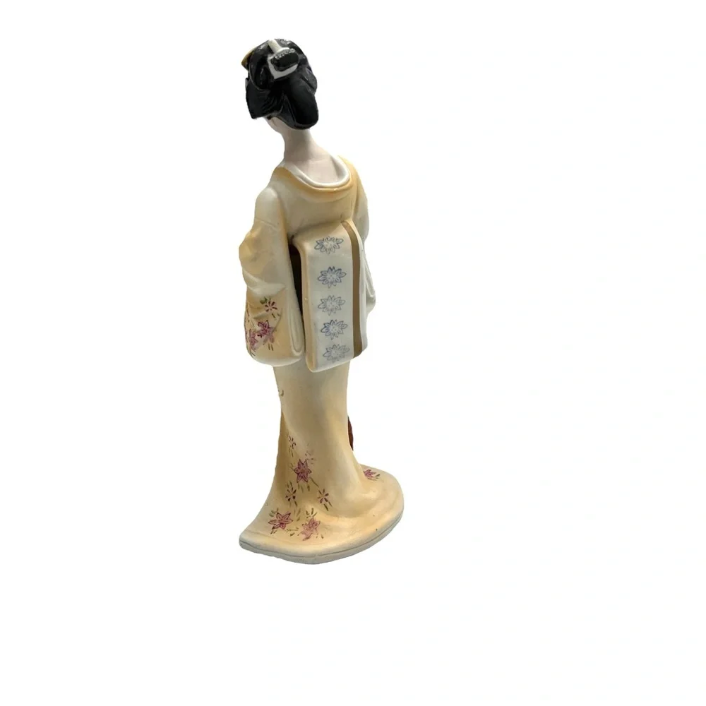 Vintage geisha holding